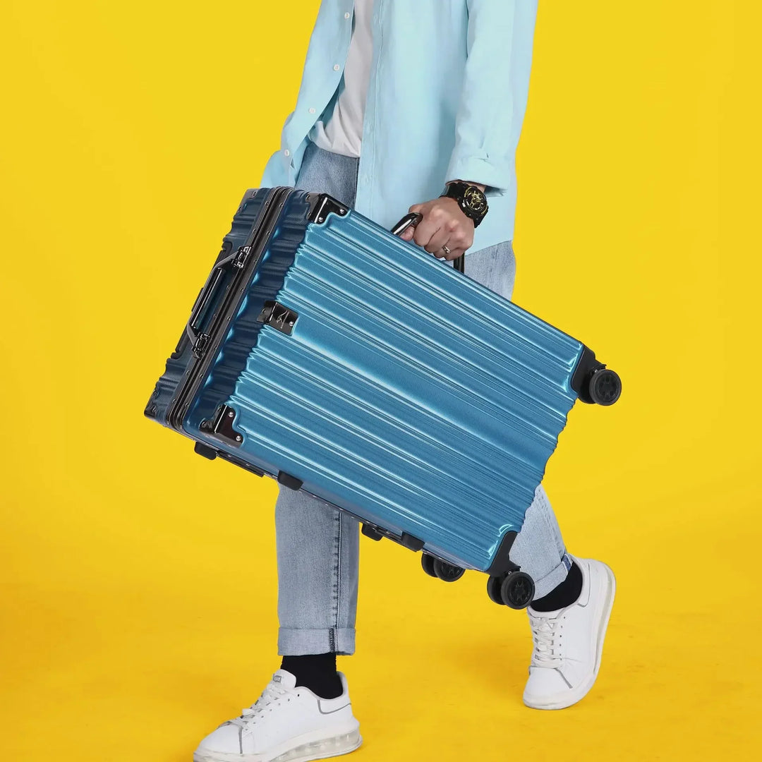 Set of durable aluminum frame hardshell suitcases in various sizes for any travel.
