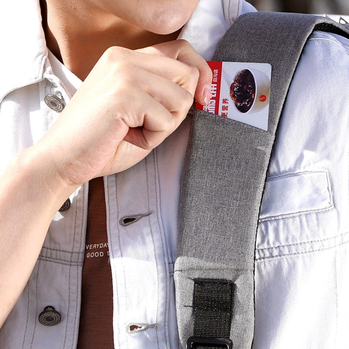 Sleek black anti-theft laptop backpack, water-resistant for daily use & secure travel with hidden zippers.