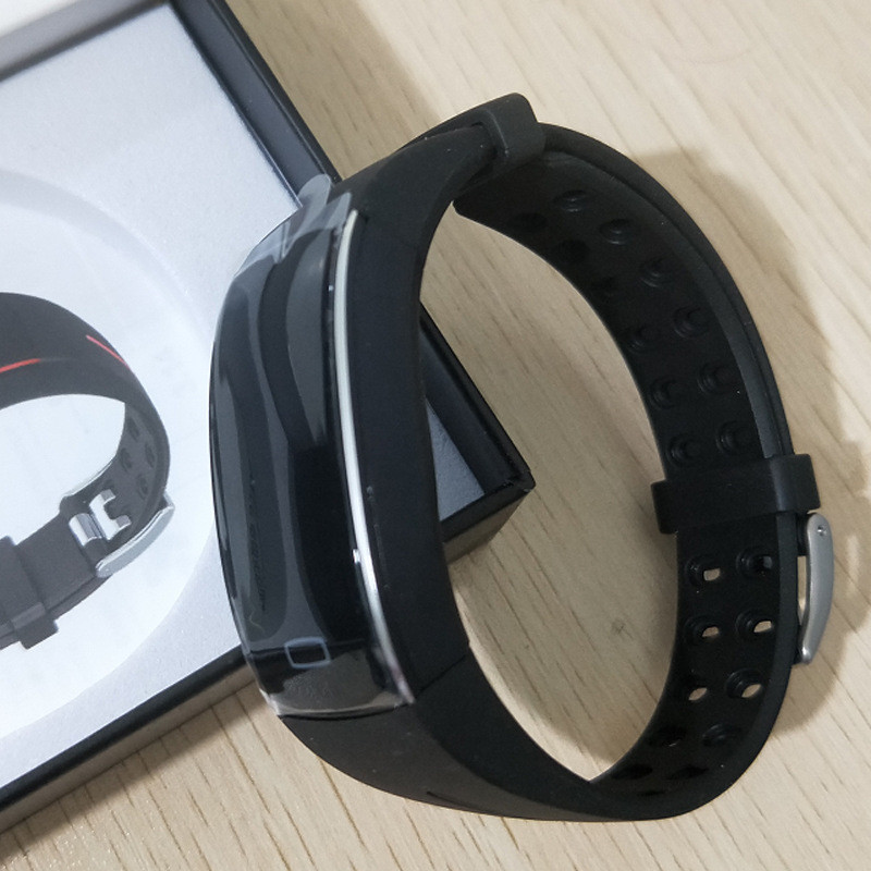 Unisex blood pressure smart watch with heart rate monitor, sleek design, and black band, displaying time and health metrics.