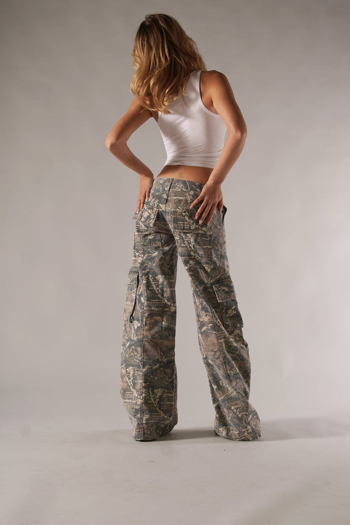 Unisex camo cargo pants with rugged utility pockets, featuring a relaxed fit and bold camo print for urban or outdoor style.
