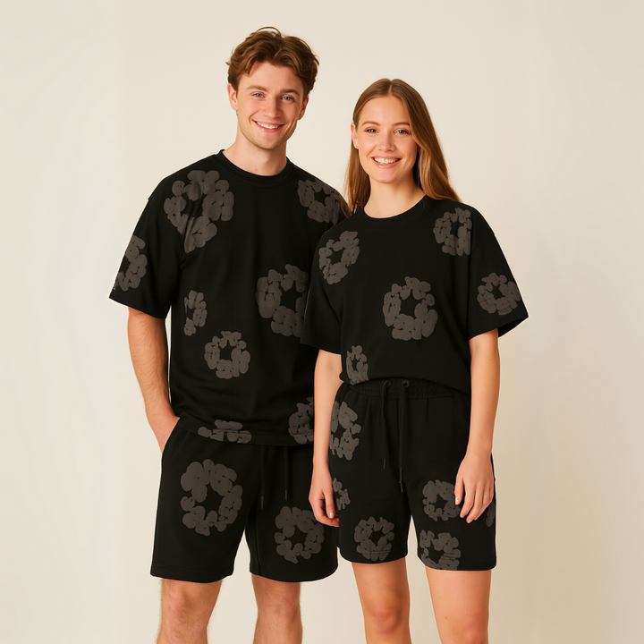Unisex cotton floral tee and shorts set, bold floral print, soft fabric, casual wear, versatile unisex design, relaxed fit.