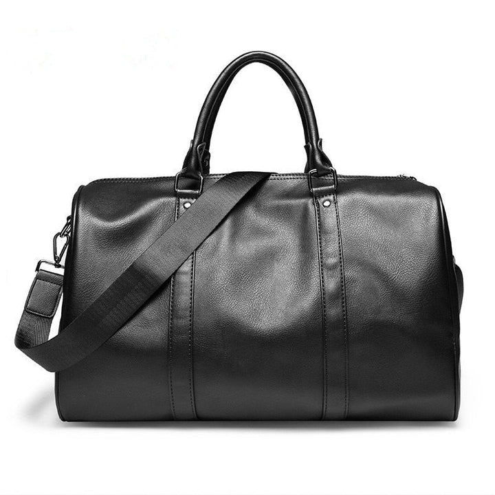 Large-capacity leather duffel bag. Durable carry-on luggage, ideal for men & women's travel.
