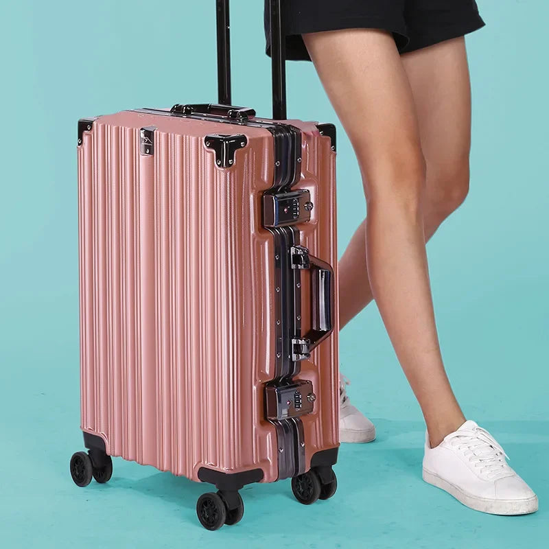 Front view of the durable unisex hardshell luggage with secure aluminum frame.