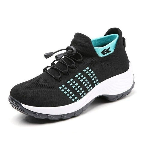 Side view of grey unisex ortho stretch cushion shoes with non-slip sole, offering arch support & pain relief.