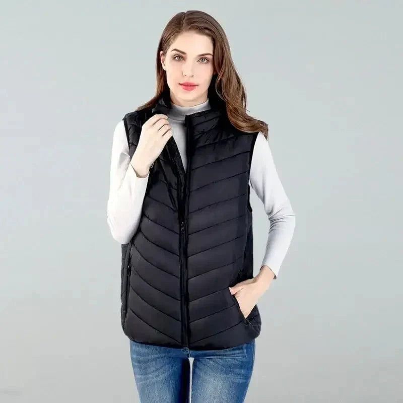 Unisex Thermo Heated Gilet front view; sleek black, advanced heating, ideal for cold weather, sports & fitness warmth.