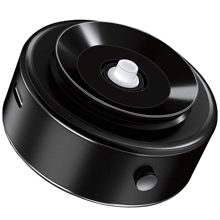 "Universal magnetic car phone holder with suction base, sleek black design, strong grip, adjustable for optimal view."