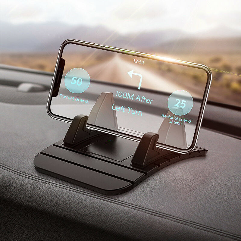 Universal non-slip phone holder for cars with silicone grip, securely holding a smartphone on a dashboard for safe driving.