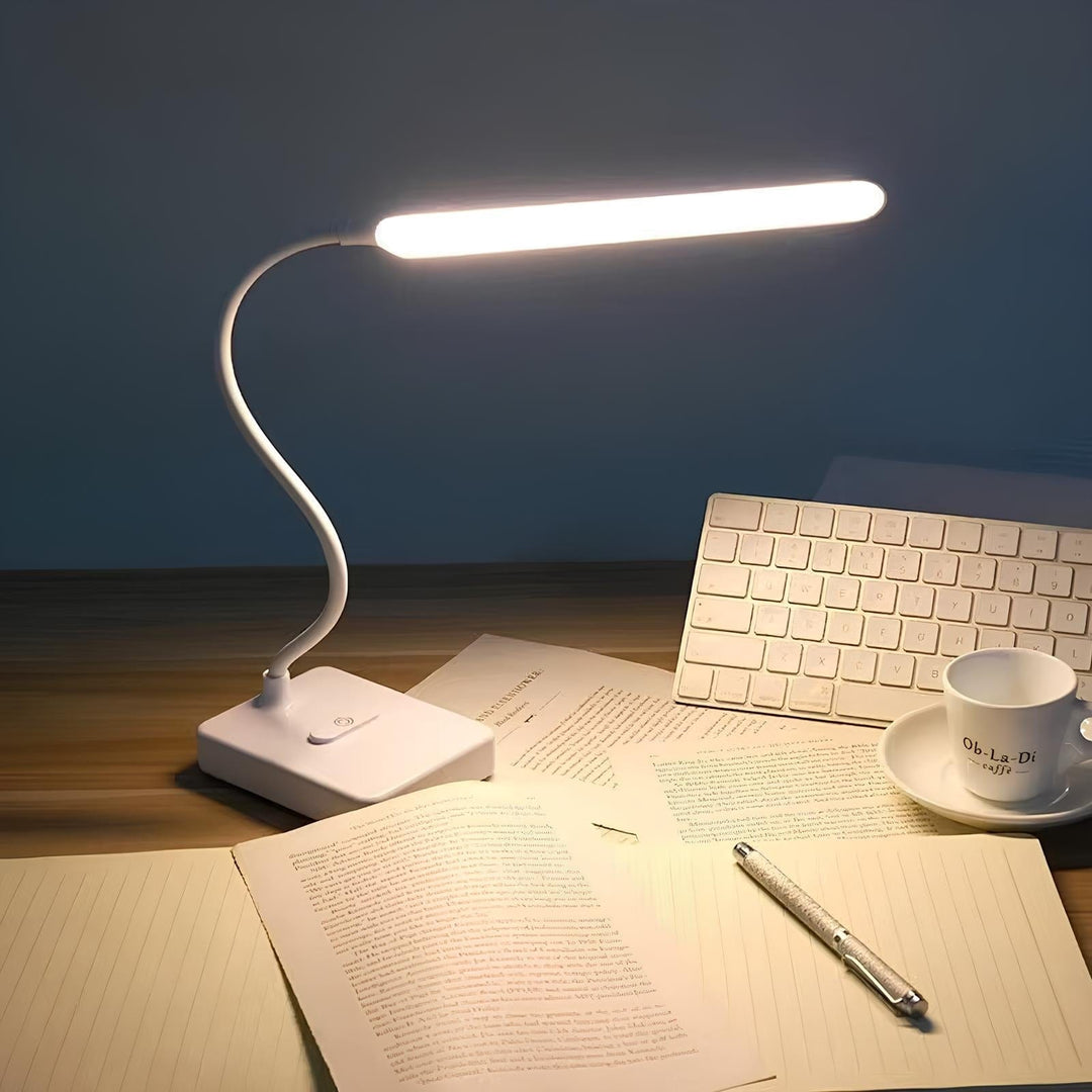 "USB rechargeable flexible arm desk lamp with adjustable neck, dimmable brightness, and three light color options."