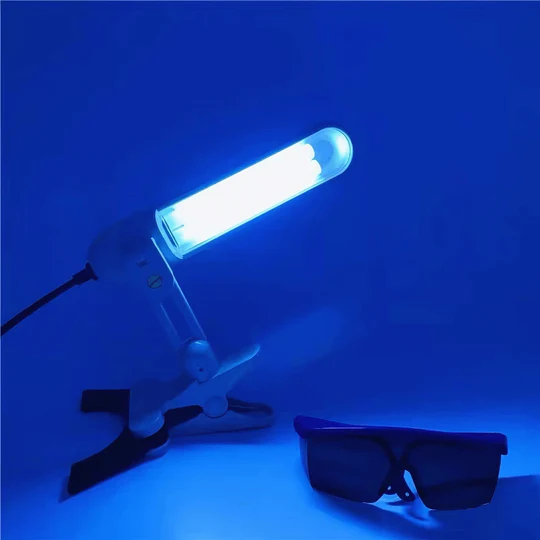 "UVB Light Therapy Lamp for psoriasis, eczema, vitiligo; sleek design with adjustable stand, emits targeted 311nm light wavel