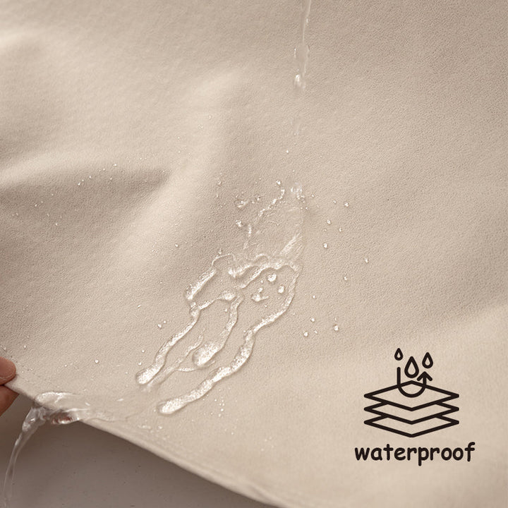 "Waterproof anti-scratch sofa cover in beige, ideal for pet owners, showcasing durable fabric and anti-slip backing."