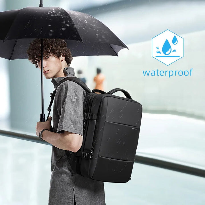 "Waterproof expandable travel backpack in black, roomy design for men and women, ideal for versatile adventures."