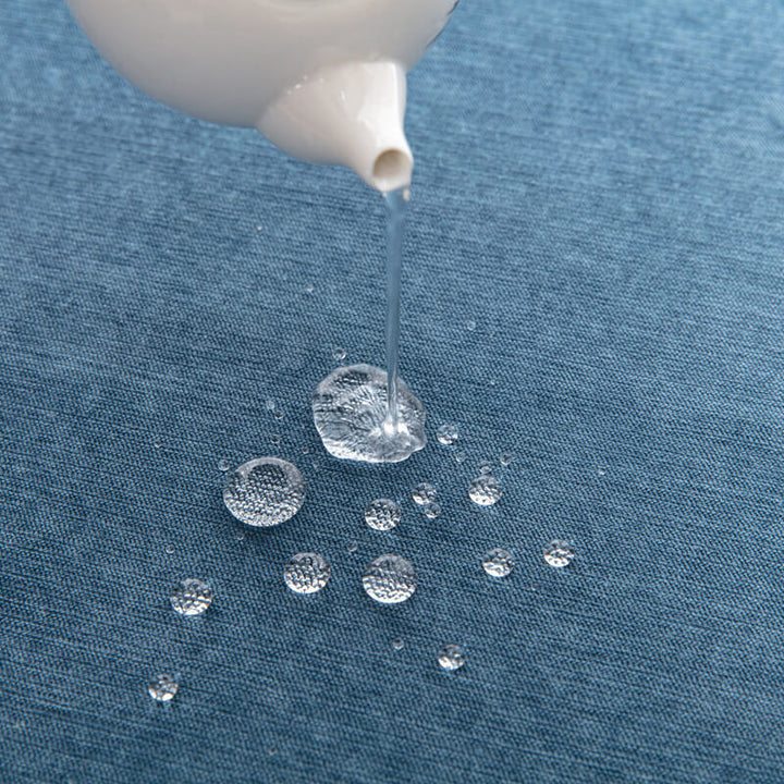 Waterproof sofa throw with jacquard edge, non-slip design, corduroy, and polyester material, protects against spills.