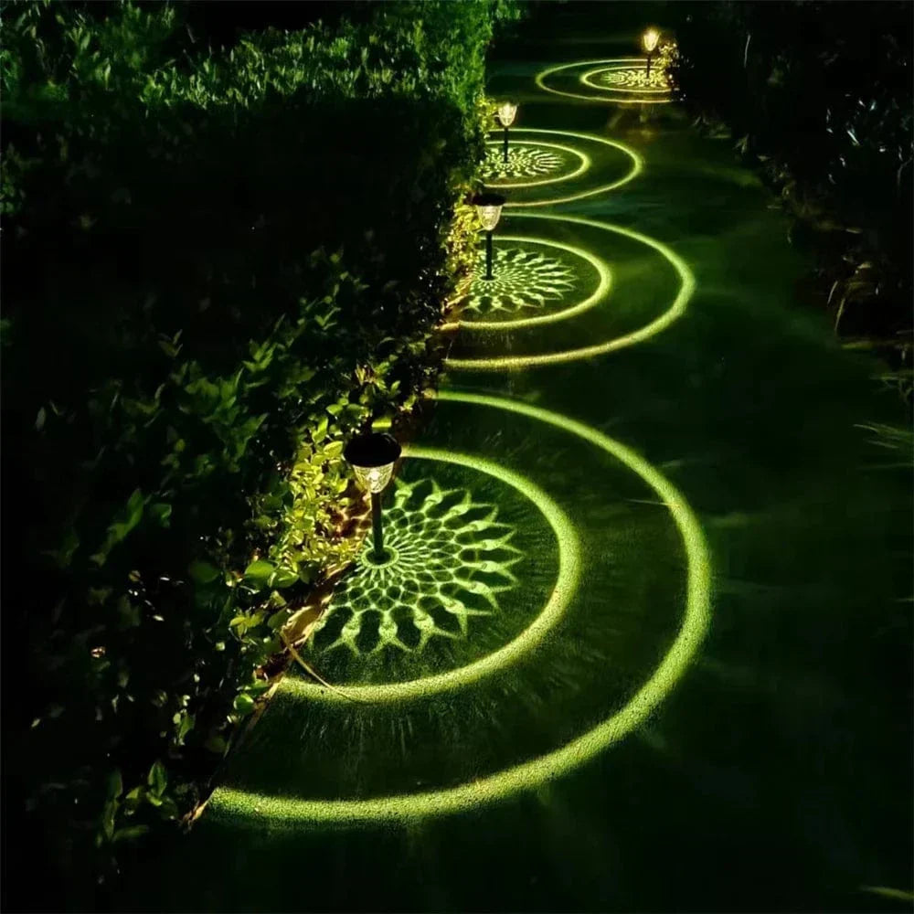 Weatherproof garden light casting intricate mandala shadows, solar-powered, LED, IP65 waterproof, enhances outdoor decor.