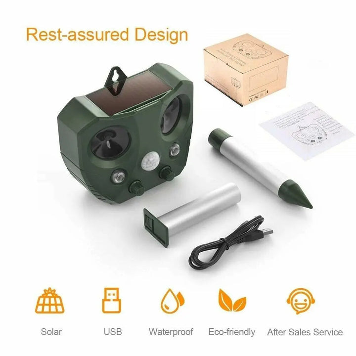 "Weatherproof solar ultrasonic animal repeller in garden, motion-activated to deter pests like cats and rodents."