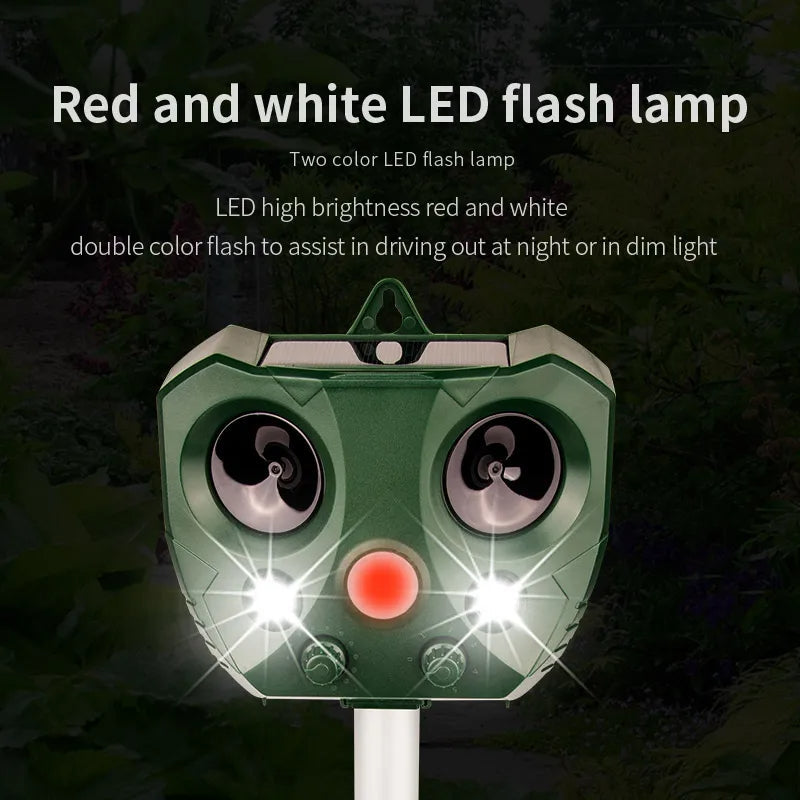 "Weatherproof solar ultrasonic animal repeller in garden, motion-activated to deter pests like cats and rodents."