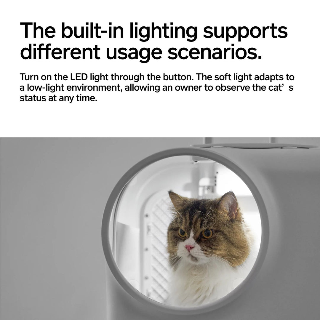 "White futuristic cat travel carrier with bubble window, ventilation, LED lighting, shock-absorbing base, and portable design