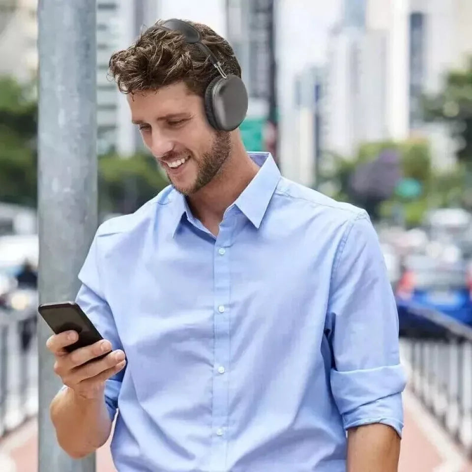 Wireless Bluetooth over-ear headphones, sleek black design, ergonomic fit, featuring noise cancellation and soft cushions.