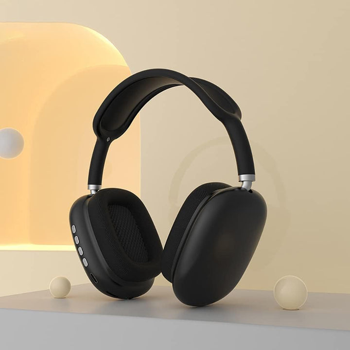 Wireless Bluetooth over-ear headphones, sleek black design, ergonomic fit, featuring noise cancellation and soft cushions.