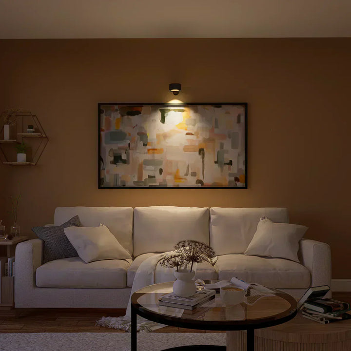 Wireless LED wall light, stick-on, black and white, cordless, for indoor and outdoor use, emits warm white glow, energy-effic