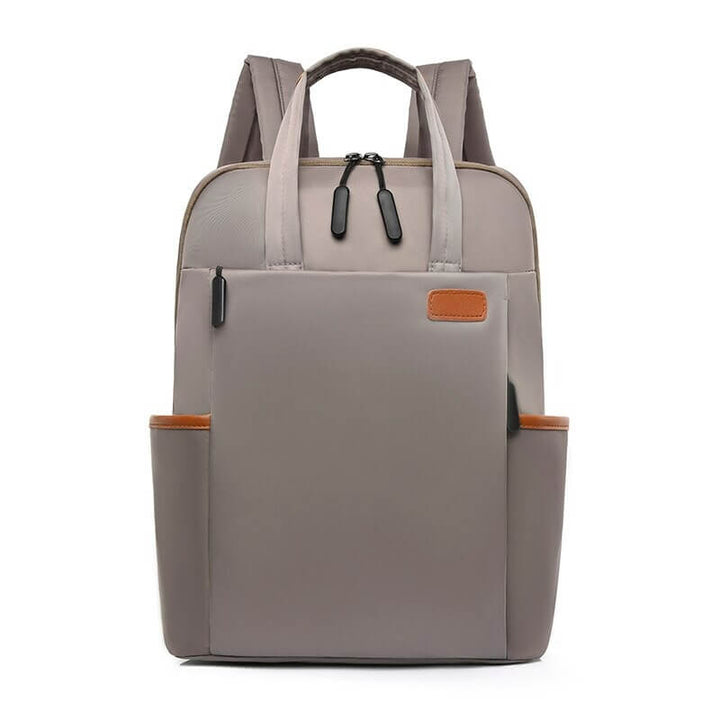 Water-resistant anti-theft travel backpack for women with secure hidden pockets.