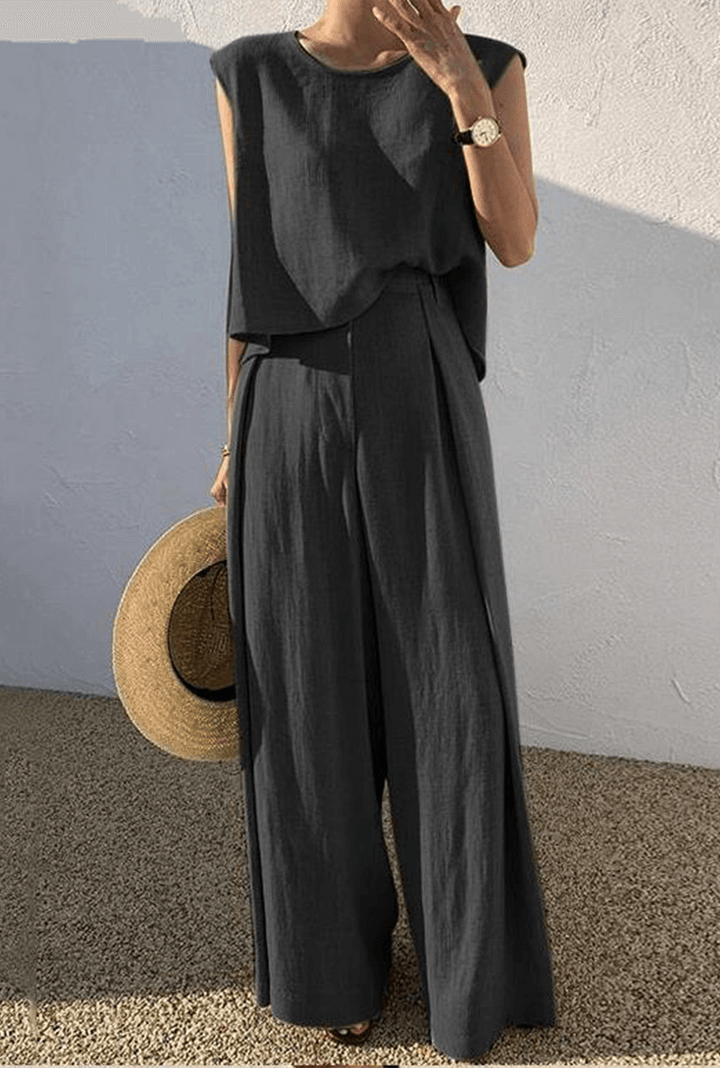 Khaki women's loose-fit minimalist two-piece set. Comfortable wide-leg pants and top for loungewear or casual chic.