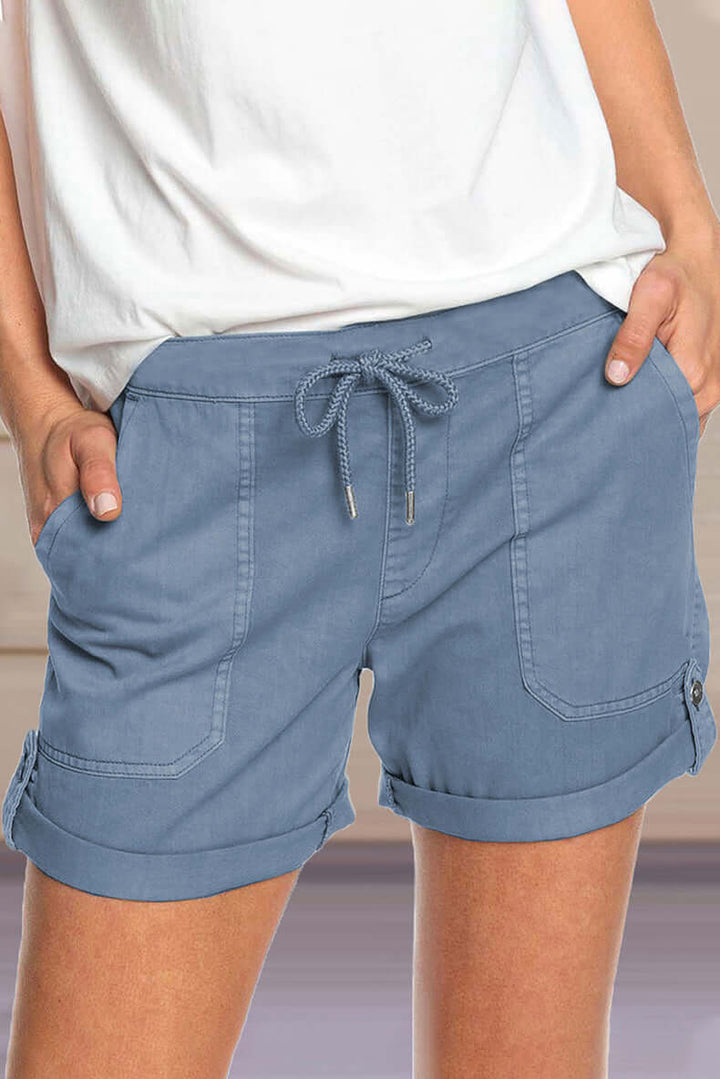 Women's black relaxed fit drawstring casual shorts, ideal for summer loungewear comfort.
