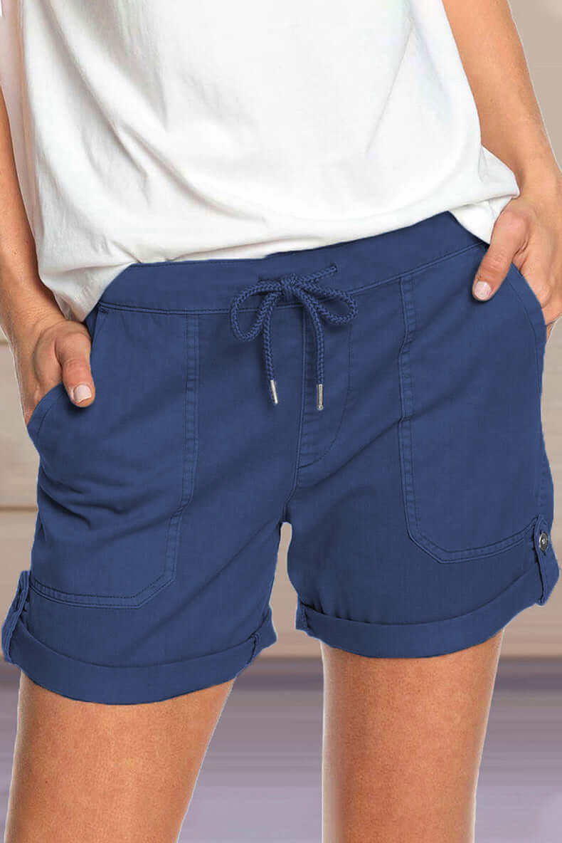 Grey women's casual shorts, relaxed fit, drawstring. A breathable bottom for summer lounging.