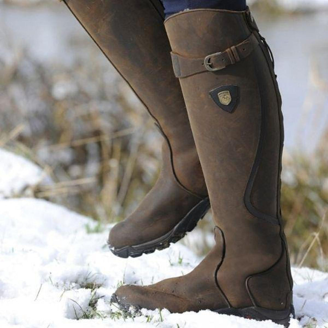 Durable women's waterproof winter riding boots, ideal for all-weather protection & outdoor comfort.
