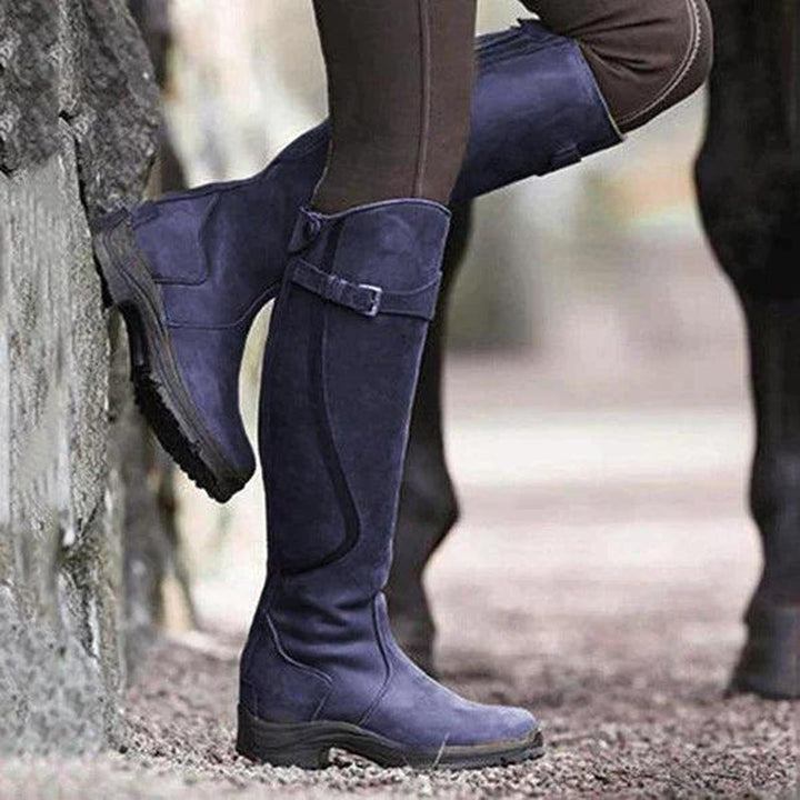 All-weather women's winter riding boots, waterproof, tall, and durable with adjustable fit for comfort.