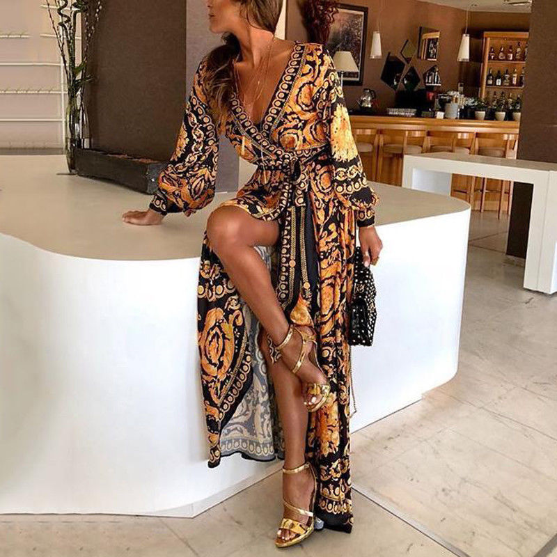 Flowy maxi boho wrap dress for women, featuring a stylish slit and long sleeves.