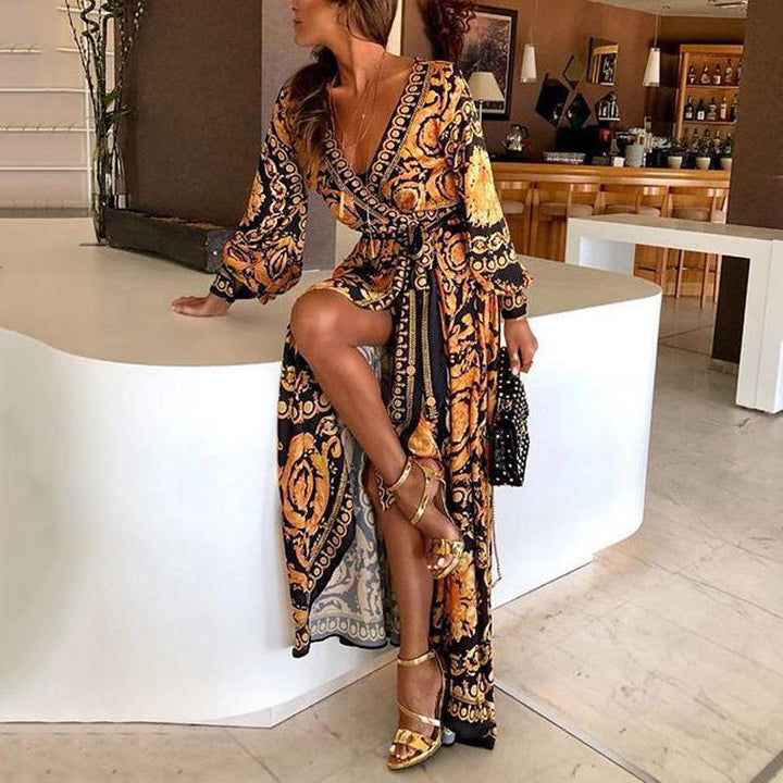 Flowy maxi boho wrap dress for women, featuring a stylish slit and long sleeves.