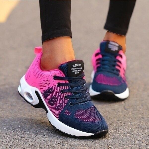 Close-up of women's comfortable lace-up sneakers, highlighting the breathable fabric and versatile design.