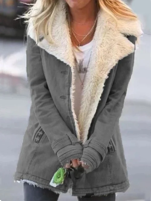 Fashionable women's long sleeve winter jacket for chilly days. Stay warm, cozy, & stylish in this outerwear.