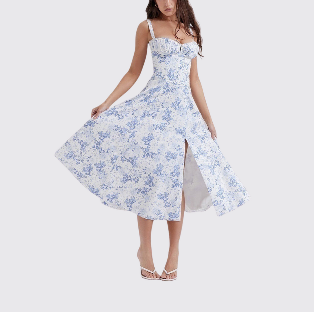 Summer-ready floral sleeveless midi dress for women, with a chic tie front and elegant, vibrant print.