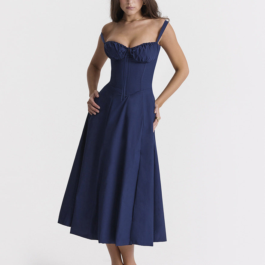 Elegant women's sleeveless floral print midi dress, featuring a flattering tie front. Great for warm weather style.