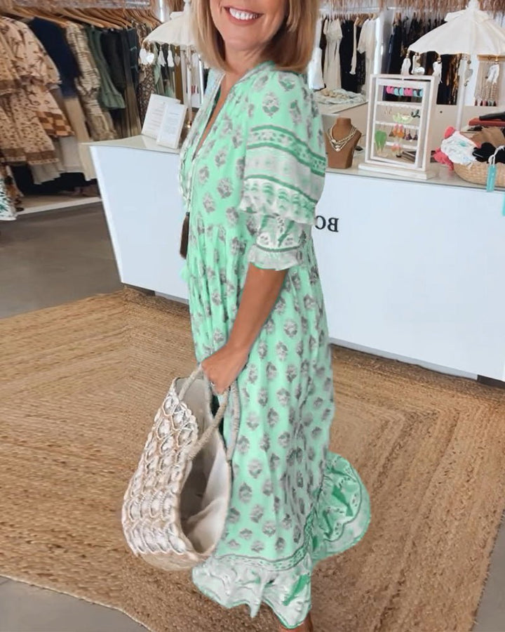Chic floral V-neck maxi dress, an elegant addition to any woman's summer wardrobe.