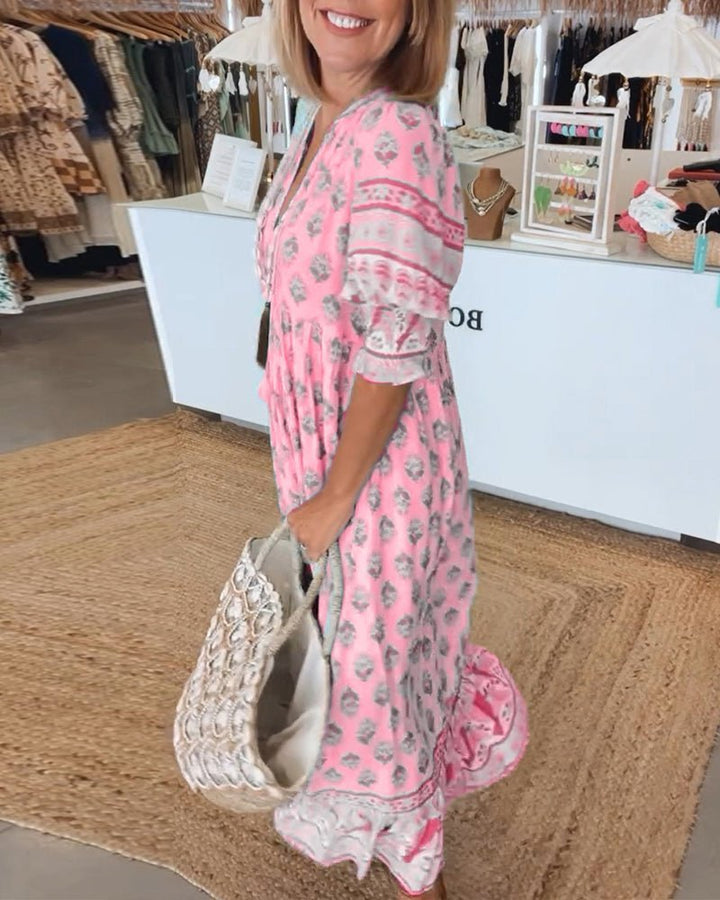 Elegant casual women's V-neck floral maxi dress, ideal for spring/summer events.