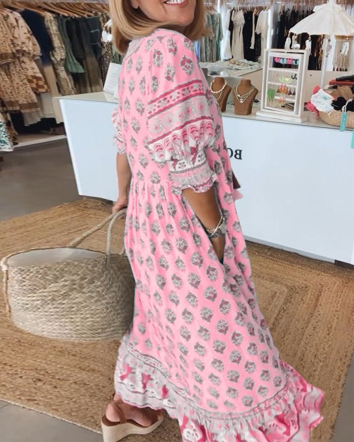 Stand out in this chic floral V-neck maxi dress, combining comfort with elegant style.