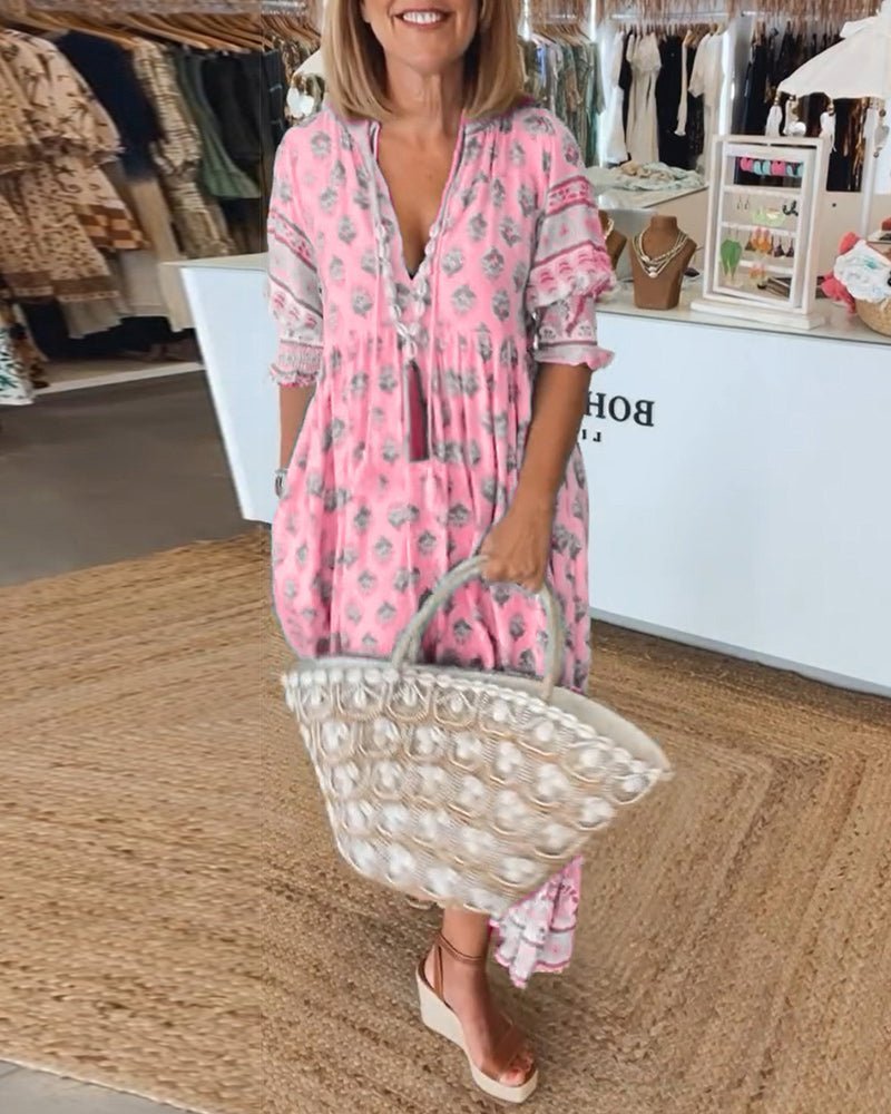 Elegant V-neck floral maxi dress for women, offering chic & comfortable style.