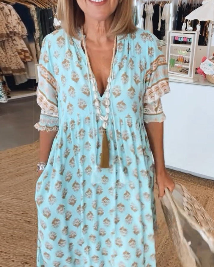 Comfortable flowy floral V-neck maxi dress for women, stylish everyday fashion.