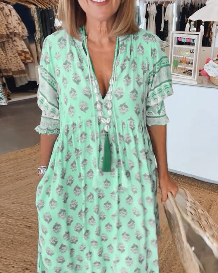 Spring/summer women's floral V-neck maxi dress, a chic and airy fashion choice.