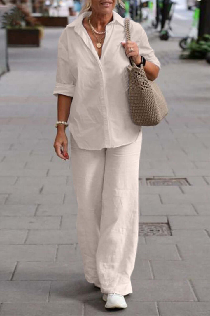 Women's chic fold-over collar long sleeve two-piece set in a versatile cotton blend for elegant fashion.