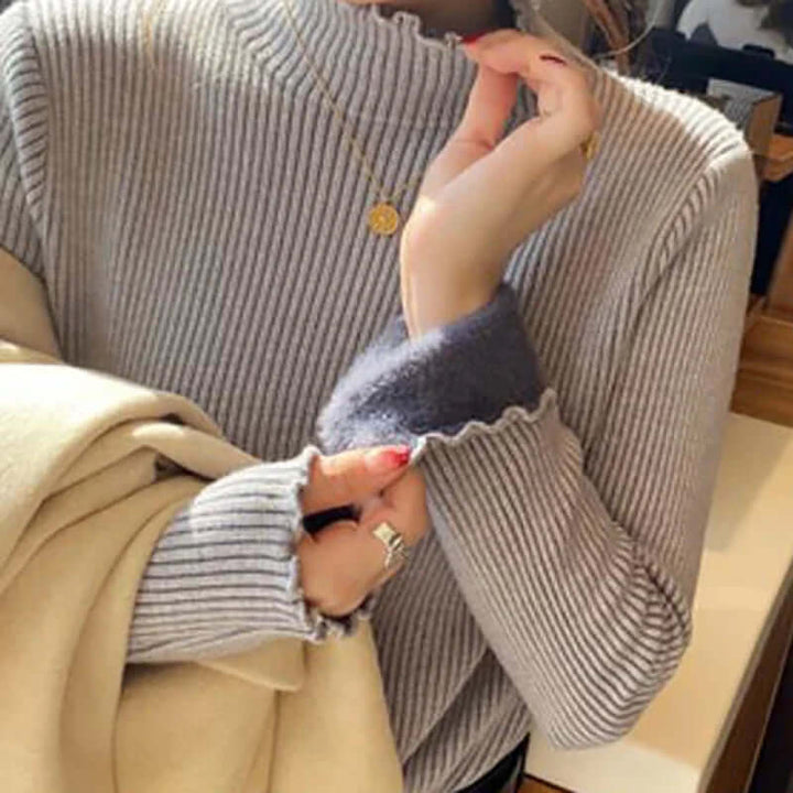Women's elegant mock neck ruffled knit sweater, a comfortable and chic pullover for autumn and winter fashion.