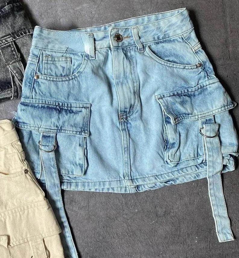 Chic women's multi-pocket A-line denim mini skirt, stylish and practical for any season.