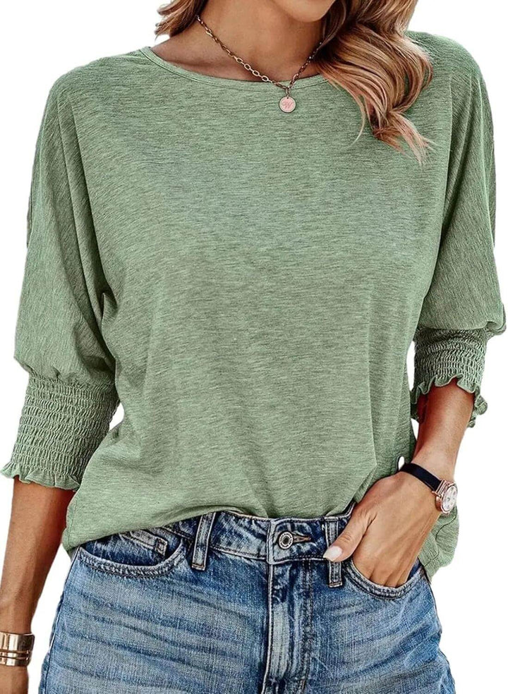 Women's chic ribbed knit long sleeve top. Versatile, comfortable style for any fashion occasion.