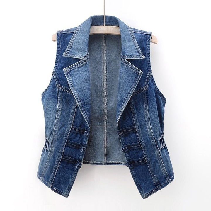 Women's chic sleeveless blue denim vest. Trendy streetwear jean vest for casual layering & women's fashion.