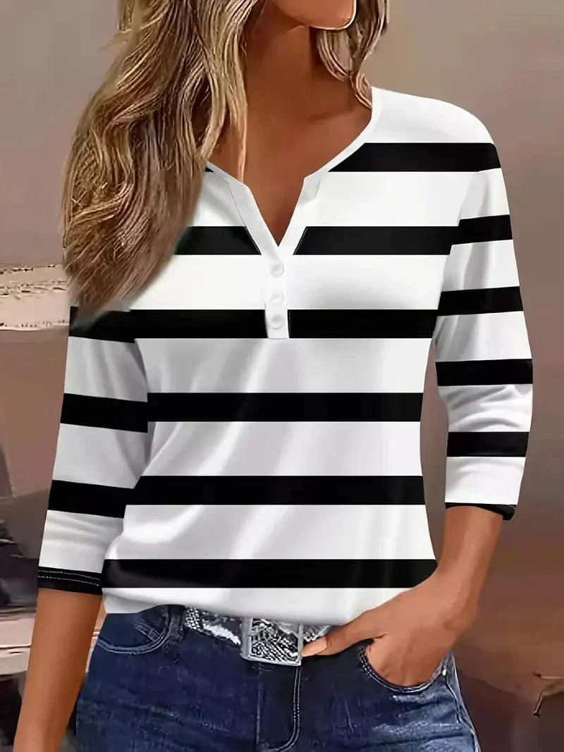 Comfortable women's striped V-neck top, versatile for casual and elegant outfits.
