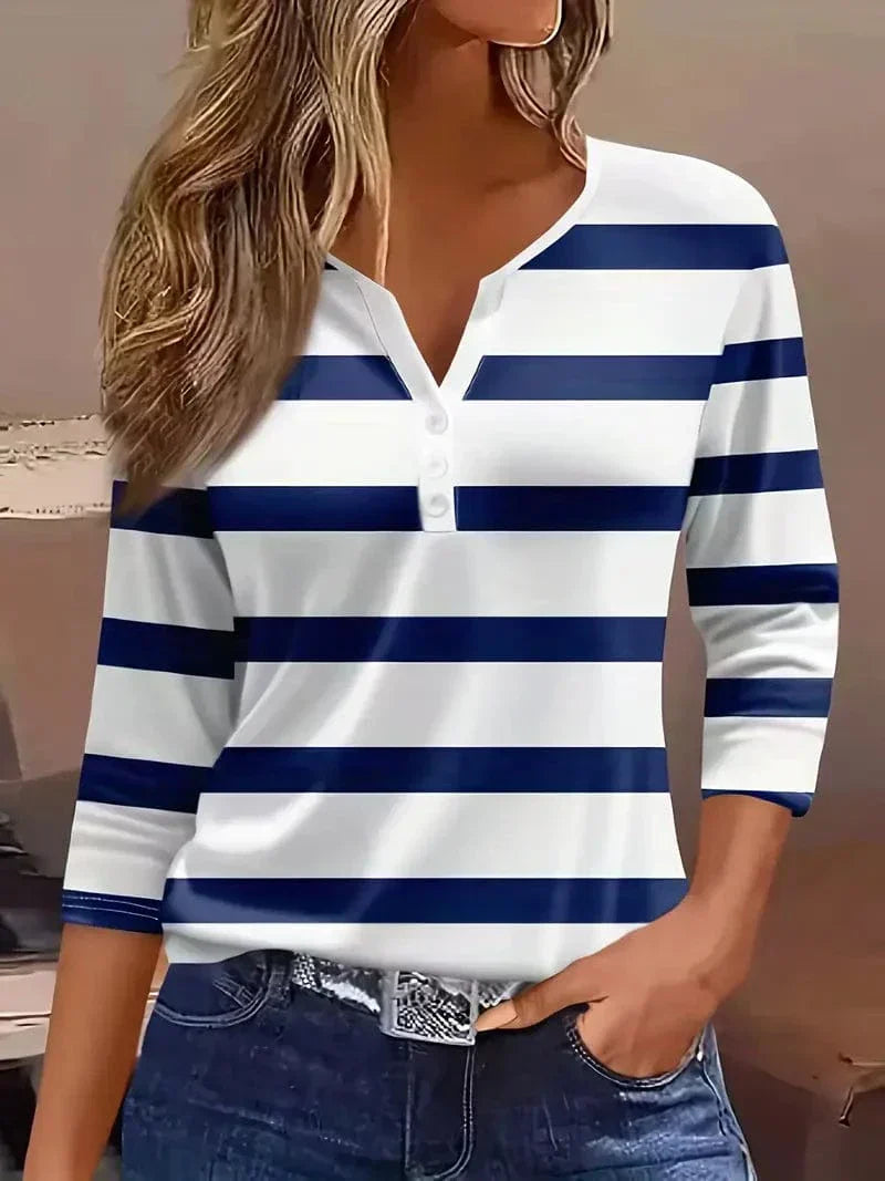 Fashionable women's V-neck striped top, ideal for effortless everyday wear.