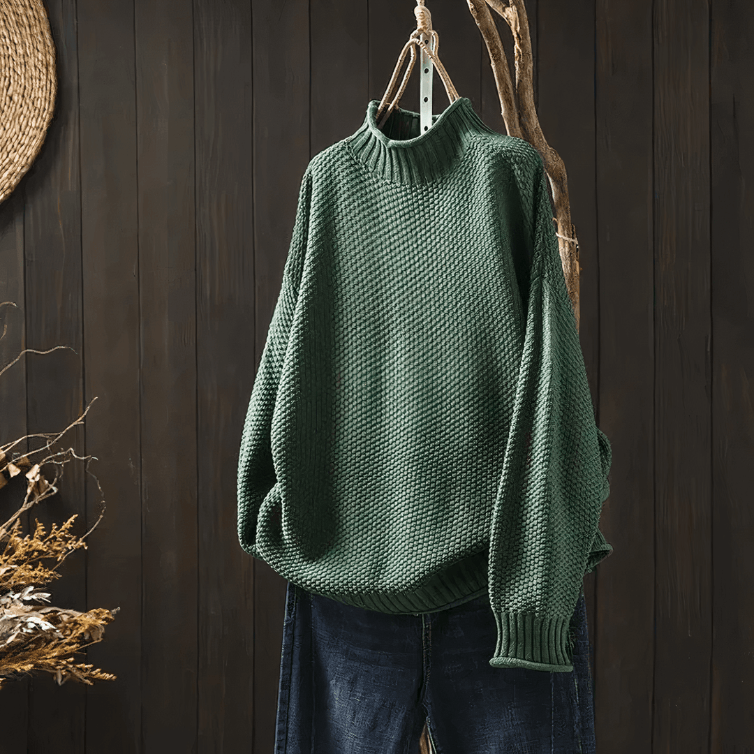 Women's classic knit turtleneck sweater in a relaxed fit, perfect for cozy winter warmth and timeless style.