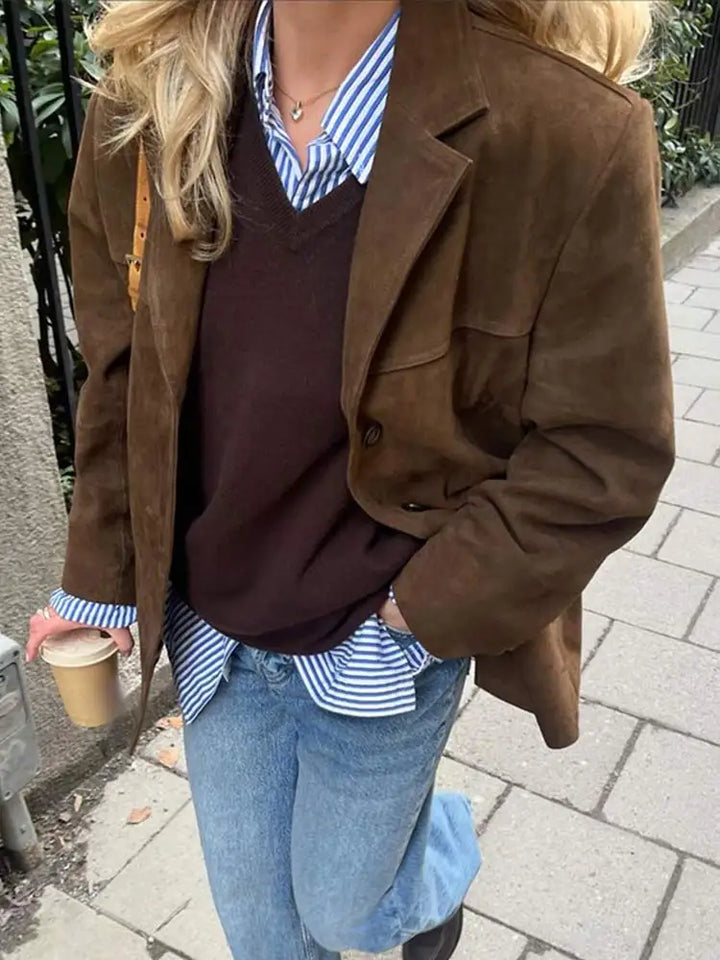 Close-up of a women's classic jacket showcasing its quality fabric and stylish details, perfect for chic fashion.